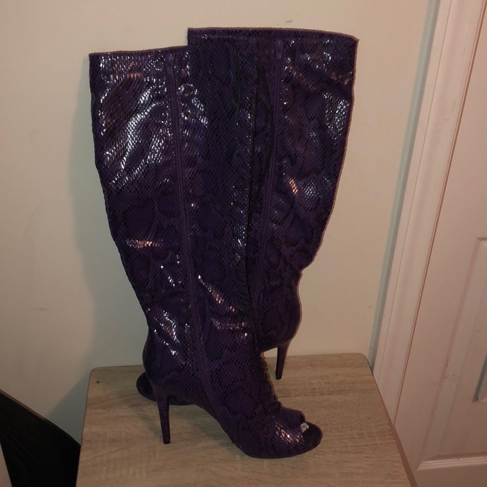 Purple snake boots never been worn
